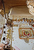 Amritsar - the Golden Temple - scriptures from the Holy Book, the Guru Granth Sahib, are continously singed (known as the Akhand Path). 